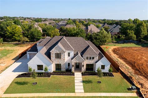 Legacy north colleyville  This custom modern transitional home includes all the amenities you could wish for! Luxury engineered hardwoods throughout, oversized island, prep kitchen including a warming drawer, marble flooring in master, and much more